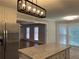 Kitchen island overlooks the living room at 6209 Southland Forest Dr, Stone Mountain, GA 30087