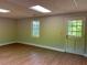 Bright basement room featuring a window and exterior access at 6209 Southland Forest Dr, Stone Mountain, GA 30087