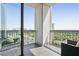 Private balcony with city views and seating area at 2828 Peachtree Nw Rd # 2002, Atlanta, GA 30305