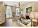 Bright living room with French doors opening to backyard at 619 Broadland Nw Rd, Atlanta, GA 30327