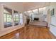 Two story living room with hardwood floors and fireplace at 990 Bramlett Shoals Rd, Lawrenceville, GA 30045