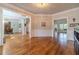 Open concept dining room with hardwood floors and views of other rooms at 990 Bramlett Shoals Rd, Lawrenceville, GA 30045