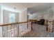 Upstairs landing overlooking the foyer, with access to bonus rooms at 990 Bramlett Shoals Rd, Lawrenceville, GA 30045