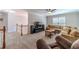 Spacious bonus room with large sectional sofa and carpeting at 990 Bramlett Shoals Rd, Lawrenceville, GA 30045