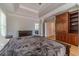 Main bedroom with built-in cabinetry and hardwood floors at 990 Bramlett Shoals Rd, Lawrenceville, GA 30045