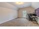 Bedroom with a workspace and a view of the backyard at 990 Bramlett Shoals Rd, Lawrenceville, GA 30045
