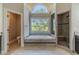 Spa-like bathroom featuring a soaking tub, walk-in shower, and tranquil view at 990 Bramlett Shoals Rd, Lawrenceville, GA 30045