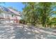 Large driveway leading to a three-car garage at 990 Bramlett Shoals Rd, Lawrenceville, GA 30045