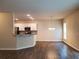 Modern kitchen with white cabinets, granite counters, and stainless steel appliances at 165 Canvas Ives Dr, Lawrenceville, GA 30045