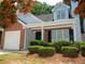 Charming ranch home with brick and light blue siding at 4538 Ravenwood Pl, Union City, GA 30291