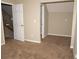 Bedroom with carpet flooring and access to a hallway at 4538 Ravenwood Pl, Union City, GA 30291