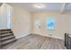 Bright entryway with hardwood floors and a view to the living room at 772 Jefferson Sw Ave, Atlanta, GA 30315