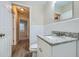 Bathroom with granite countertop and white vanity at 772 Jefferson Sw Ave, Atlanta, GA 30315