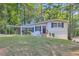 Charming ranch home with a covered carport and landscaped yard at 772 Jefferson Sw Ave, Atlanta, GA 30315