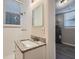 Clean bathroom with granite countertop and shower at 772 Jefferson Sw Ave, Atlanta, GA 30315