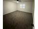 Spacious bedroom with neutral carpeting and ceiling fan at 330 Winding River Dr # B, Atlanta, GA 30350