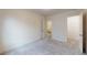 Cozy bedroom with carpet, private bathroom access, and a closet at 51 S Auburn Landing Pl # 51, Auburn, GA 30011