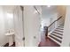 Bright foyer with powder room and hardwood floors at 51 S Auburn Landing Pl # 51, Auburn, GA 30011