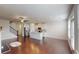 Open concept living room and kitchen with hardwood floors and island at 51 S Auburn Landing Pl # 51, Auburn, GA 30011
