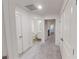 Upstairs hallway with doors to bedrooms and bathroom at 51 S Auburn Landing Pl # 51, Auburn, GA 30011