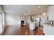 Open concept living room and kitchen with hardwood floors and island at 51 S Auburn Landing Pl # 51, Auburn, GA 30011