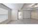 Spacious primary bedroom with carpet and en-suite bathroom access at 51 S Auburn Landing Pl # 51, Auburn, GA 30011
