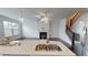 Modern kitchen with island, stainless steel appliances, and fireplace at 51 S Auburn Landing Pl # 51, Auburn, GA 30011