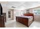 Spacious basement bedroom with a king-size bed and dresser at 4396 Highway 166, Douglasville, GA 30135