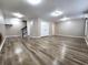 Finished basement with neutral walls and vinyl flooring at 4024 Towne Creek Cv, Duluth, GA 30097