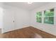 Bright bedroom with hardwood floors and large windows at 1215 Richland Sw Rd, Atlanta, GA 30310