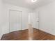 Simple bedroom with hardwood floors and neutral walls at 1215 Richland Sw Rd, Atlanta, GA 30310