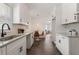 Newly renovated kitchen with white cabinets and granite countertops at 1215 Richland Sw Rd, Atlanta, GA 30310