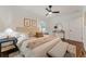 King-size bed in a well-lit bedroom with hardwood floors at 1215 Richland Sw Rd, Atlanta, GA 30310