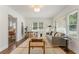 Living room with hardwood floors and kitchen view at 1215 Richland Sw Rd, Atlanta, GA 30310