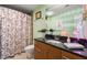 Bathroom with granite vanity and updated fixtures at 3300 Windy Ridge Se Pkwy # 1110, Atlanta, GA 30339