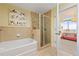 Spa-like bathroom with soaking tub and separate shower at 3300 Windy Ridge Se Pkwy # 1110, Atlanta, GA 30339