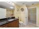 Modern bathroom with granite vanity, walk-in shower, and large closet at 3300 Windy Ridge Se Pkwy # 1110, Atlanta, GA 30339