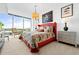 Main bedroom with a floral comforter and city views at 3300 Windy Ridge Se Pkwy # 1110, Atlanta, GA 30339