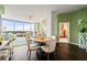 Bright dining room with city views and hardwood floors at 3300 Windy Ridge Se Pkwy # 1110, Atlanta, GA 30339