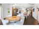 Round dining table with white chairs and hardwood floors at 3300 Windy Ridge Se Pkwy # 1110, Atlanta, GA 30339