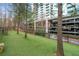 Artificial turf dog park with benches and water at 3300 Windy Ridge Se Pkwy # 1110, Atlanta, GA 30339