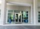 Modern glass and concrete building entrance at 3300 Windy Ridge Se Pkwy # 1110, Atlanta, GA 30339