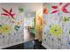 Bright entryway with a colorful floral wall mural at 3300 Windy Ridge Se Pkwy # 1110, Atlanta, GA 30339