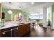 Open concept kitchen with island and city views at 3300 Windy Ridge Se Pkwy # 1110, Atlanta, GA 30339