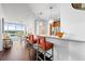 Modern kitchen with breakfast bar and hardwood floors at 3300 Windy Ridge Se Pkwy # 1110, Atlanta, GA 30339