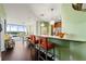 Modern kitchen with breakfast bar and hardwood floors at 3300 Windy Ridge Se Pkwy # 1110, Atlanta, GA 30339