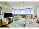 Relaxing living room with large windows and city views at 3300 Windy Ridge Se Pkwy # 1110, Atlanta, GA 30339