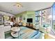 Spacious living room with a large TV and ample seating at 3300 Windy Ridge Se Pkwy # 1110, Atlanta, GA 30339