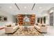 Comfortable lobby with sofas, a large TV, and built-in shelves at 3300 Windy Ridge Se Pkwy # 1110, Atlanta, GA 30339
