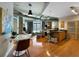 Open concept living area with hardwood floors and a modern kitchen at 115 W Peachtree Nw Pl # 301, Atlanta, GA 30313
